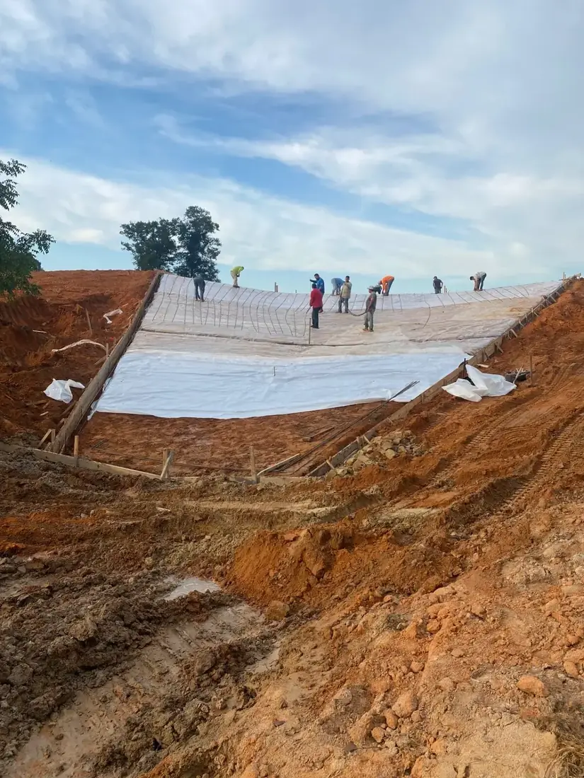 Lake spillway concrete pour — before