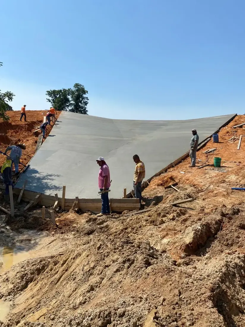 Lake spillway concrete pour — after