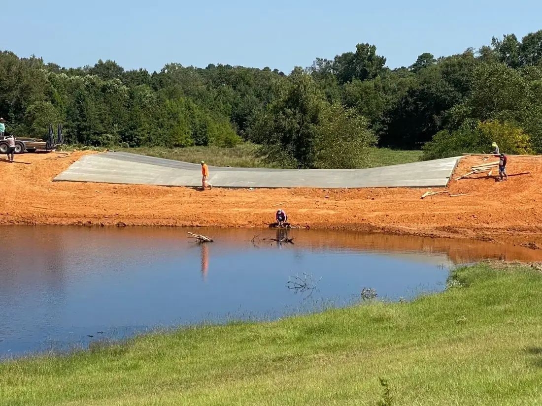 Lake spillway concrete pour — after